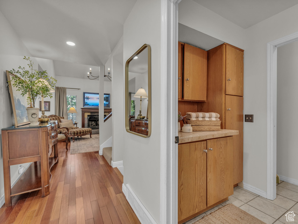 Hall with recessed lighting and light wood-style floors