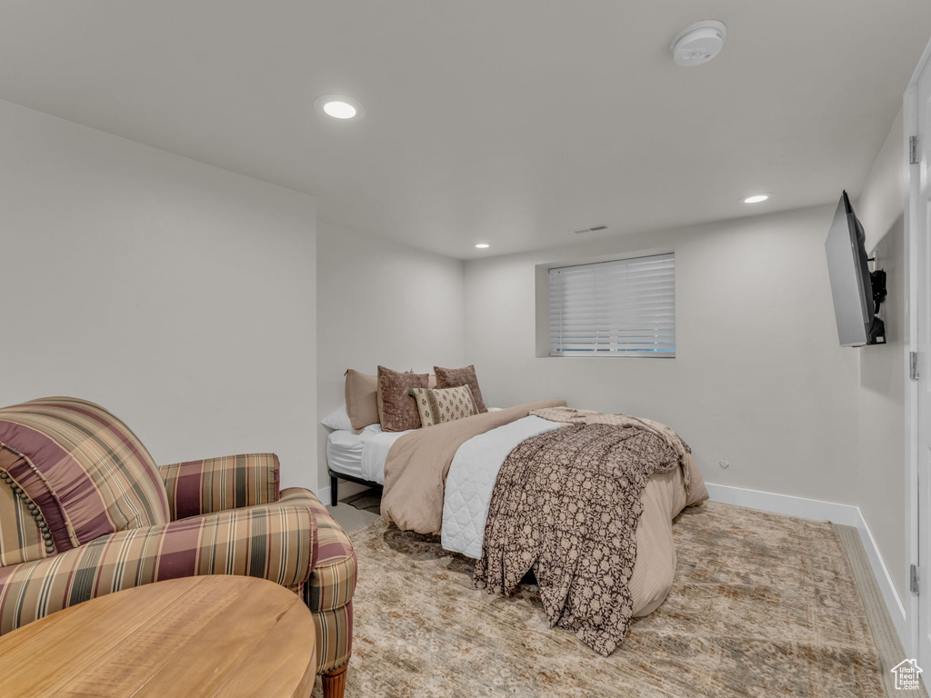 Carpeted bedroom featuring recessed lighting