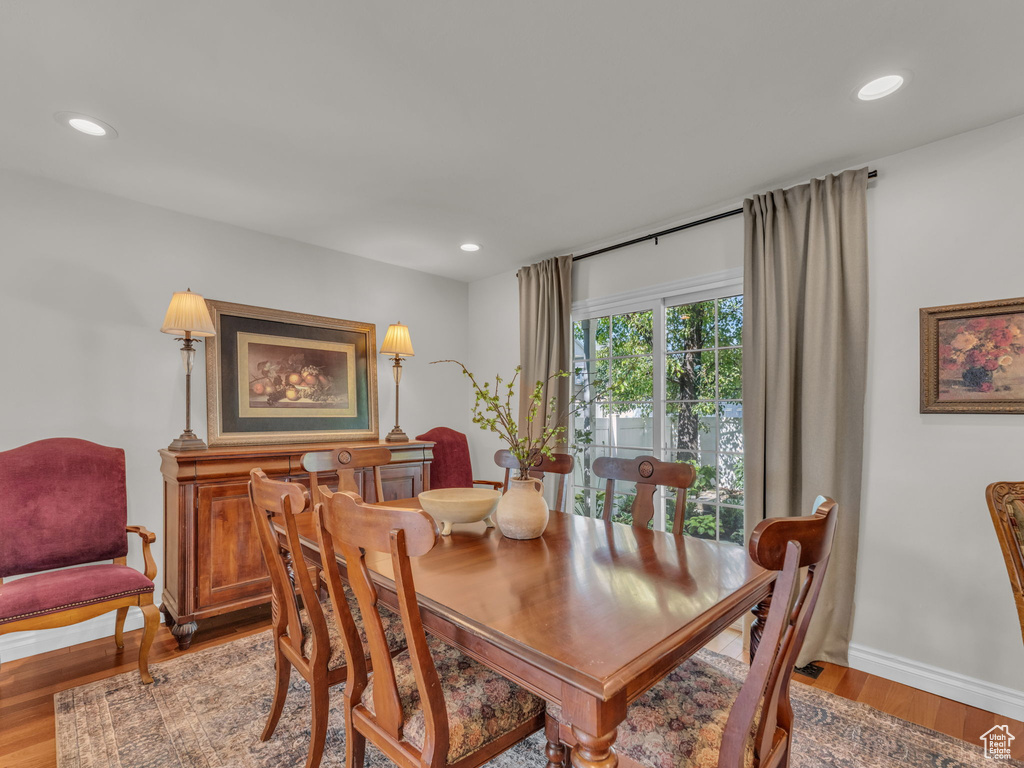 Dining space featuring light wood-style flooring and recessed lighting