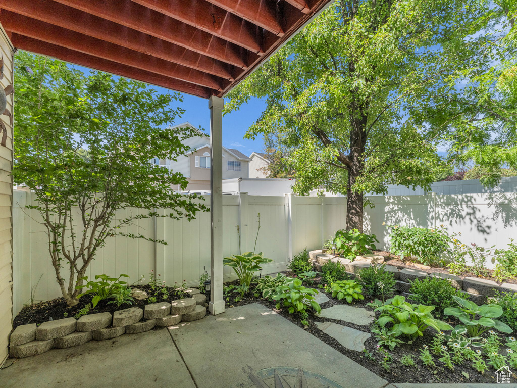 Fenced backyard featuring a patio area