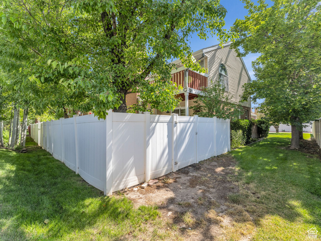 View of yard featuring a wooden deck