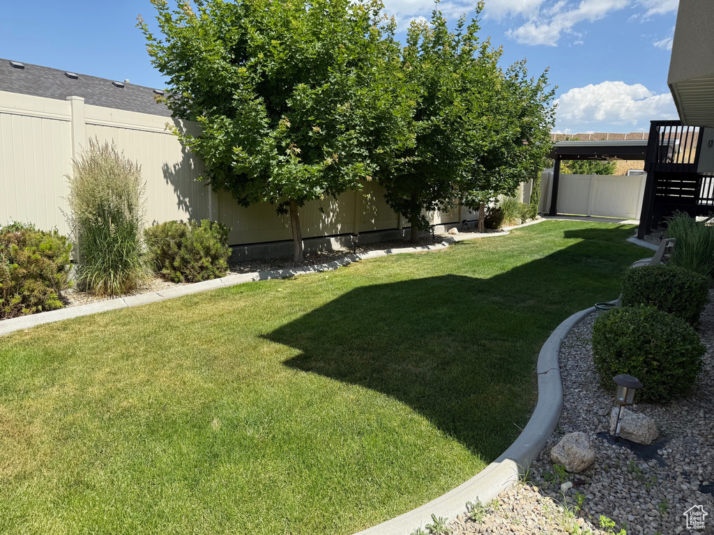 View of fenced backyard