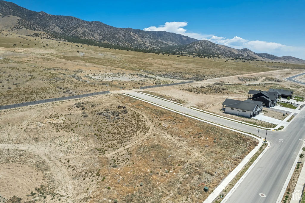 View of mountain backdrop featuring rural landscape and a desert landscape