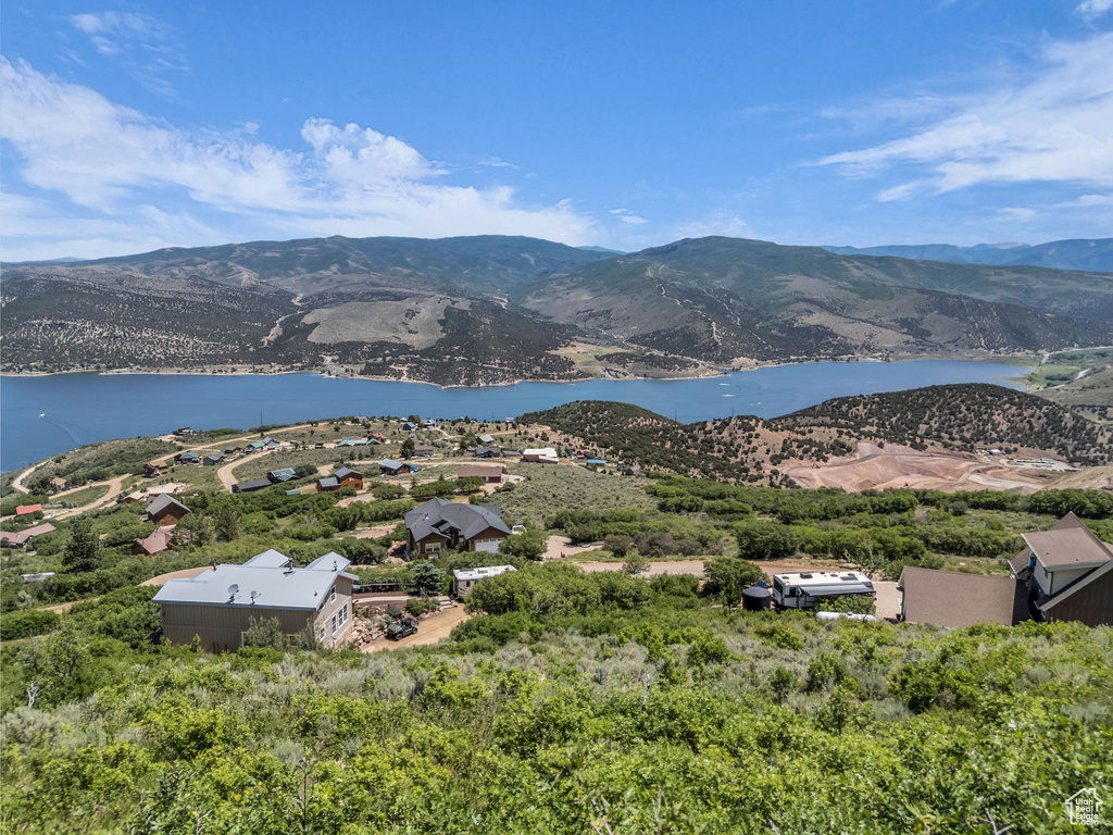 View of mountain background with a nearby body of water