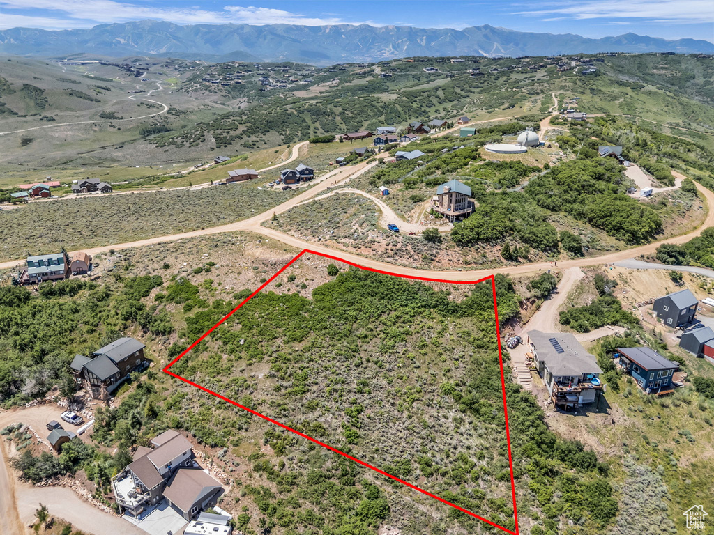 View of rural area featuring property boundaries highlighted and a mountainous background