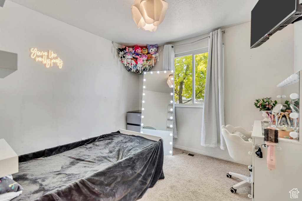 Bedroom featuring carpet floors