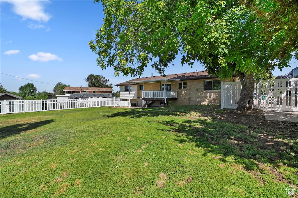 View of fenced backyard