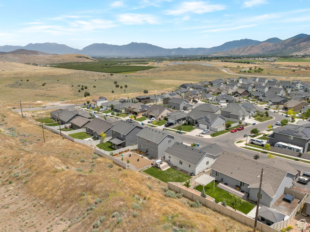 Aerial view of residential area with a mountain backdrop