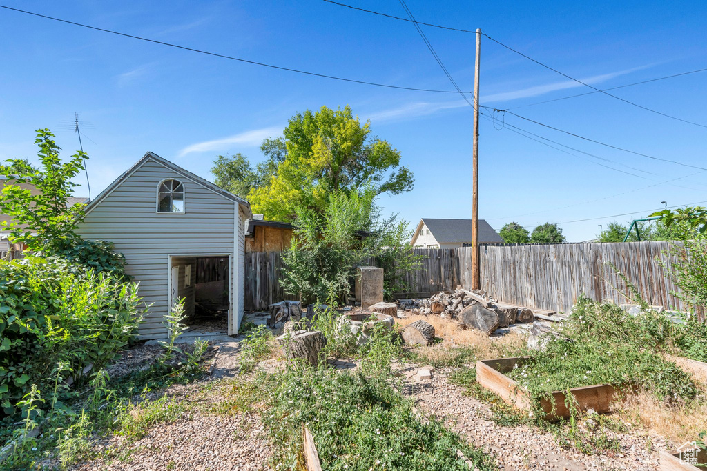 View of yard with a vegetable garden