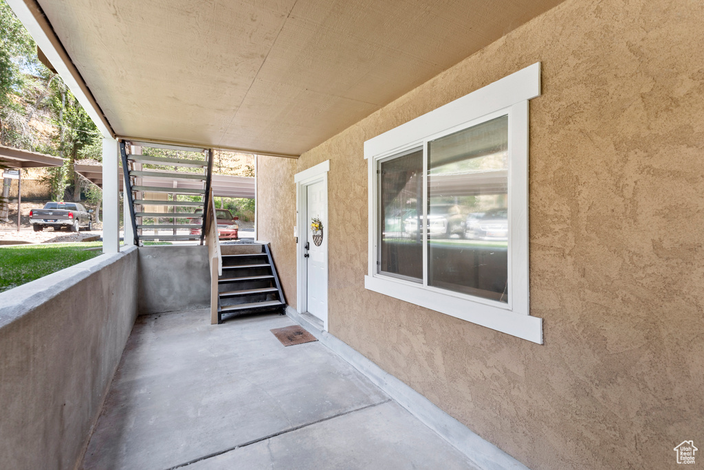 View of patio featuring stairs