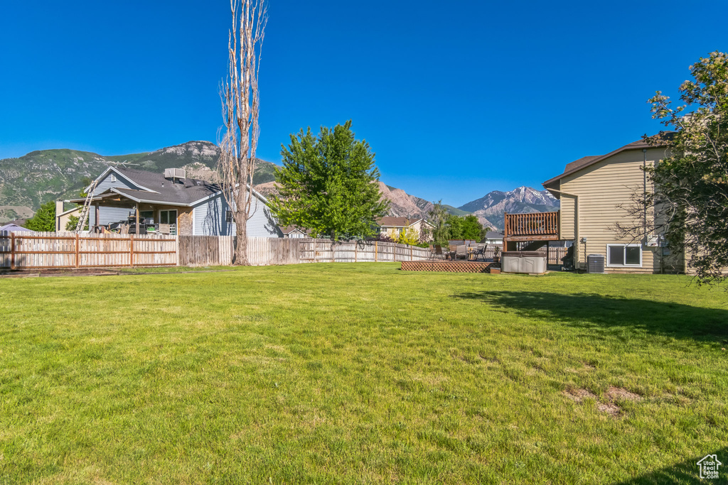 View of yard with a mountain view