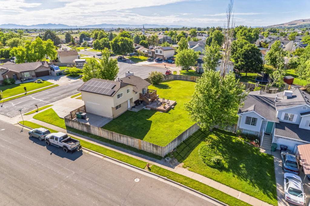 Aerial view of residential area with a mountainous background