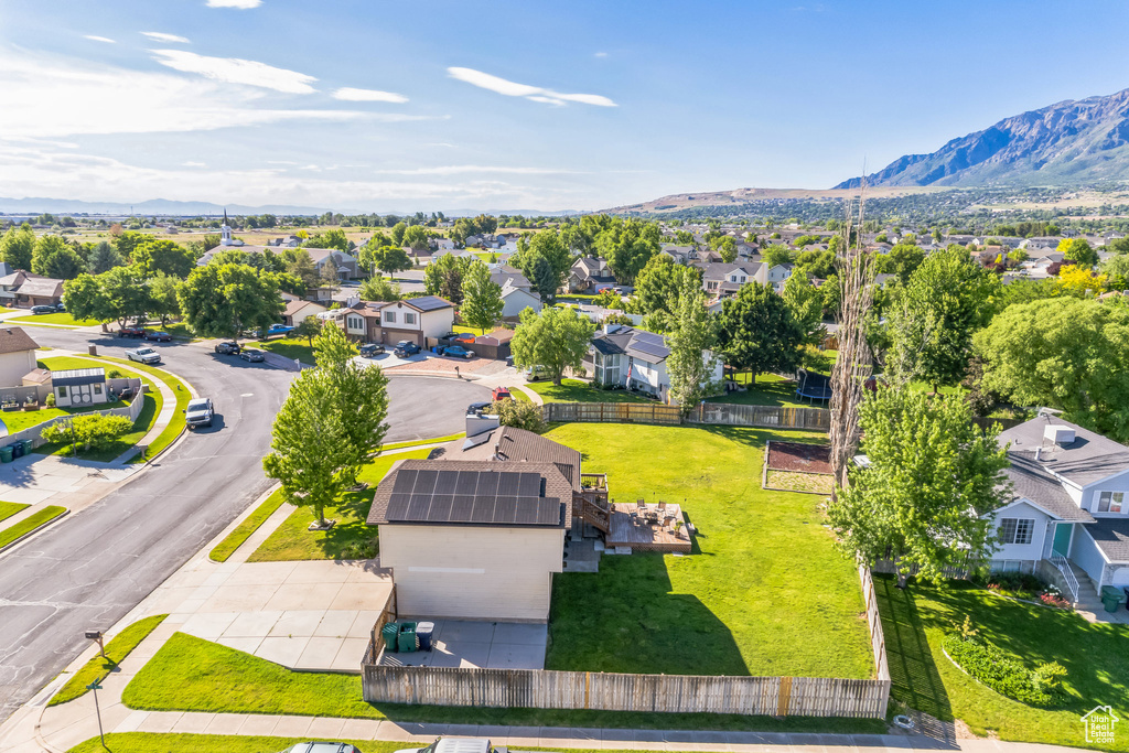 Aerial view of residential area with a mountainous background