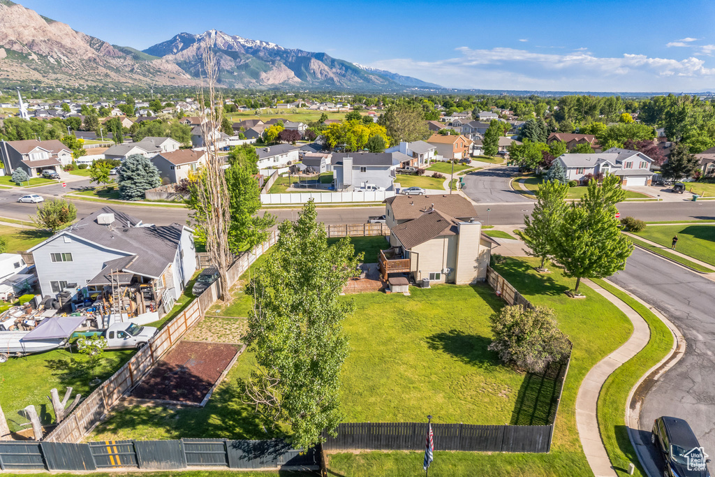 Aerial view of residential area with a mountainous background