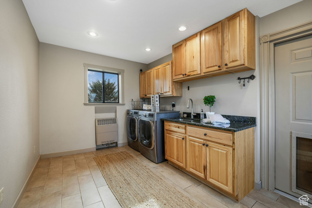 Laundry room featuring washer and clothes dryer, cabinet space, recessed lighting, and light tile patterned floors