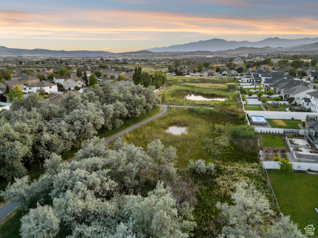 Aerial view at dusk of a residential view and a mountain view