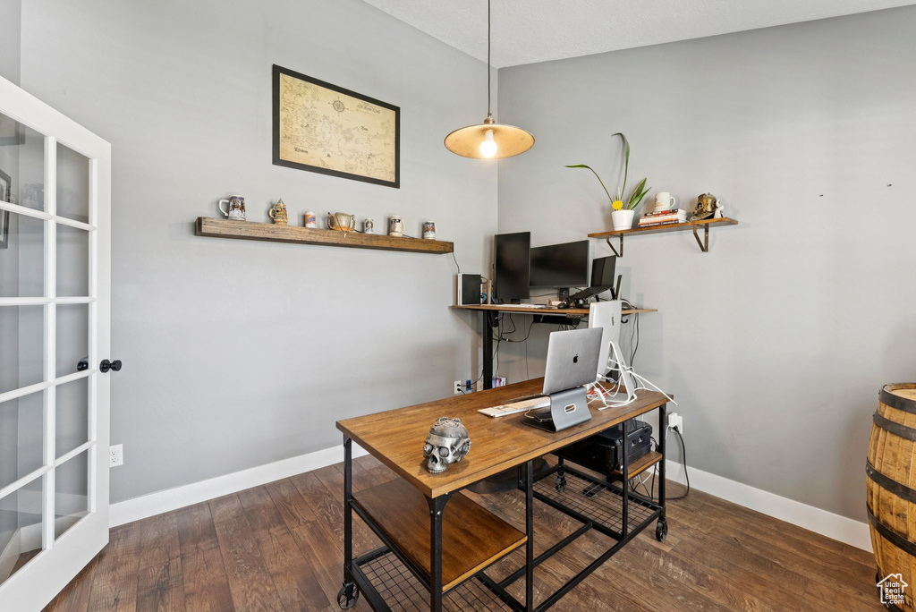Office area featuring wood finished floors