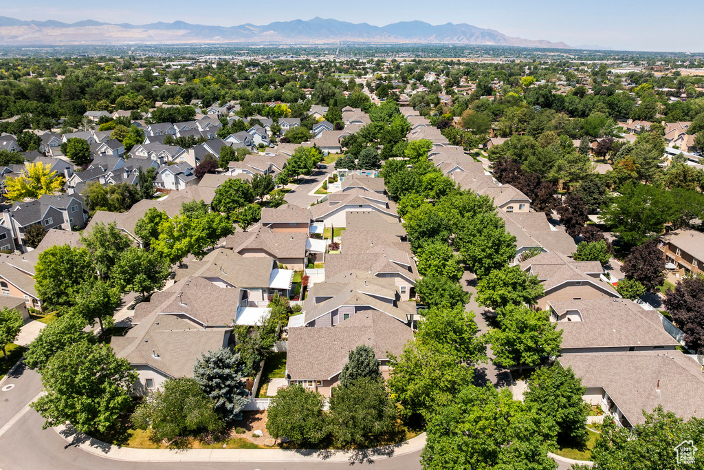Aerial view of residential area with a mountain backdrop