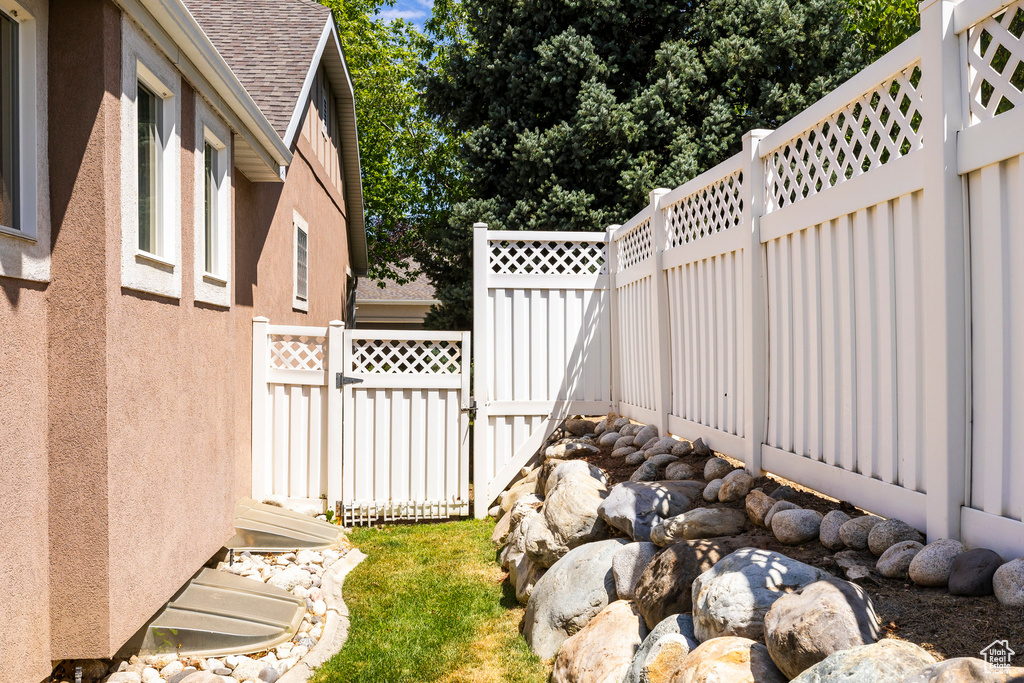 View of yard with a gate