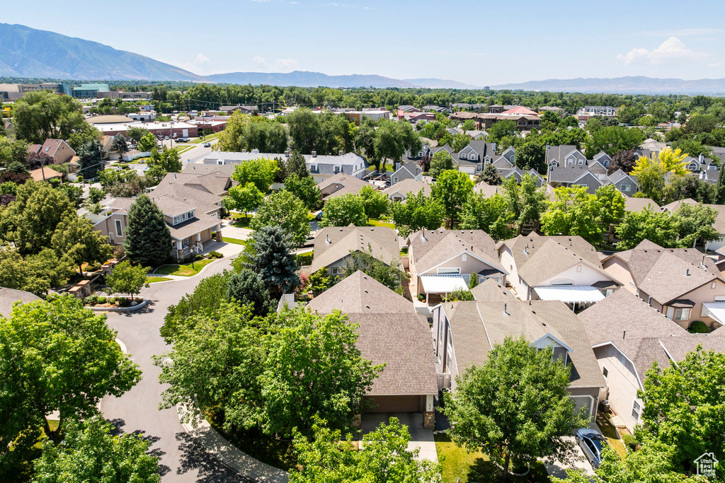 Aerial view of residential area with a mountain backdrop