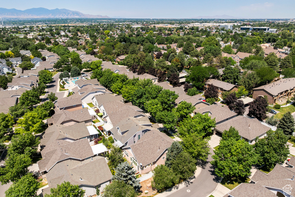 Aerial view of residential area with a mountain backdrop