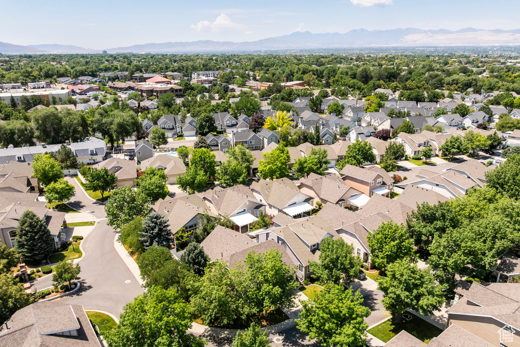 Aerial view of residential area with mountains
