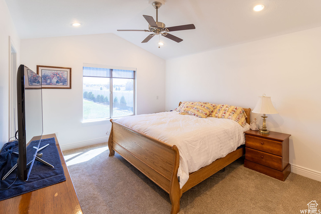 Bedroom featuring carpet flooring, vaulted ceiling, recessed lighting, and ceiling fan