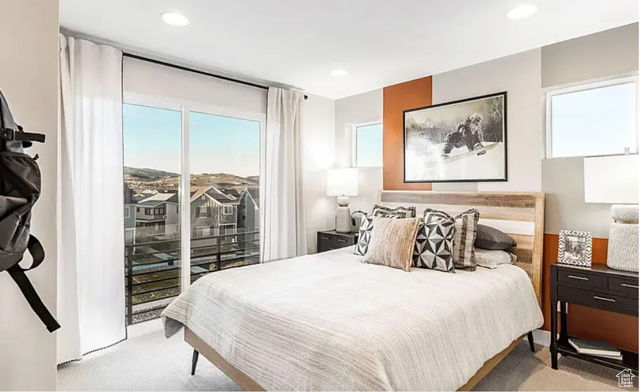 Bedroom featuring light carpet, access to outside, and recessed lighting