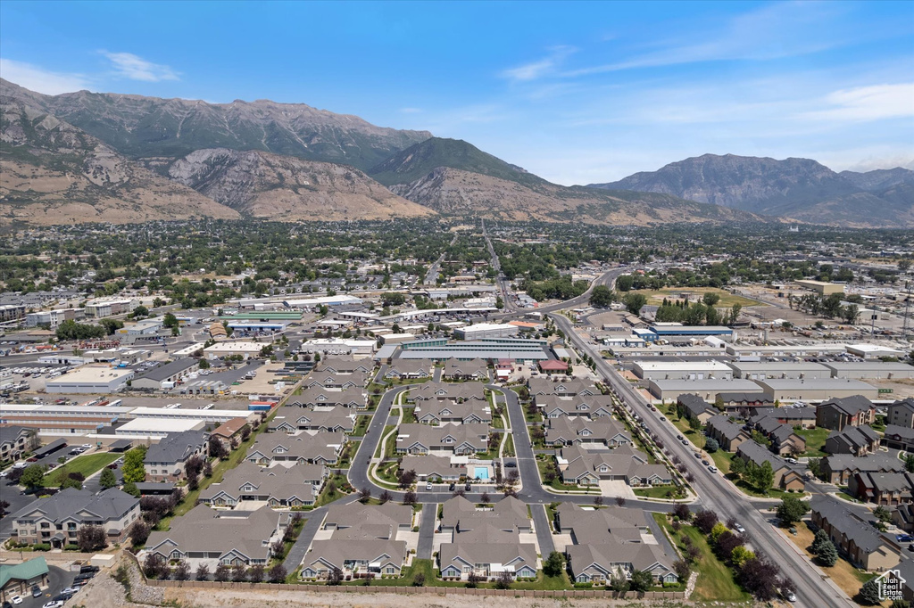 View of mountain background featuring nearby suburban area