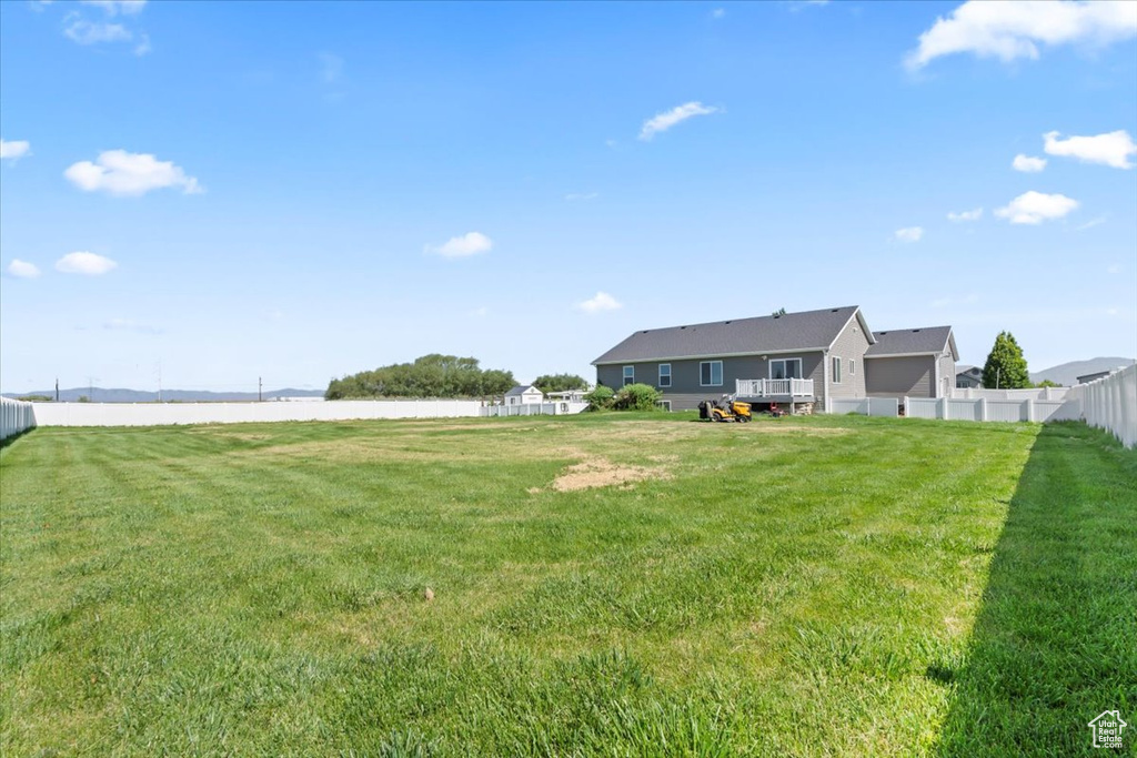 View of yard featuring a deck