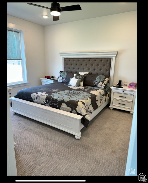 Bedroom featuring carpet flooring and ceiling fan