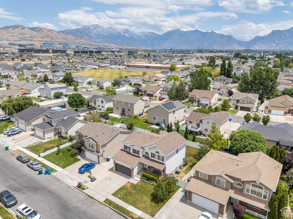 Aerial view of residential area with mountains