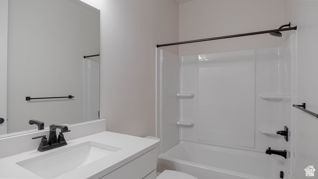 Full bathroom with vanity and shower / washtub combination