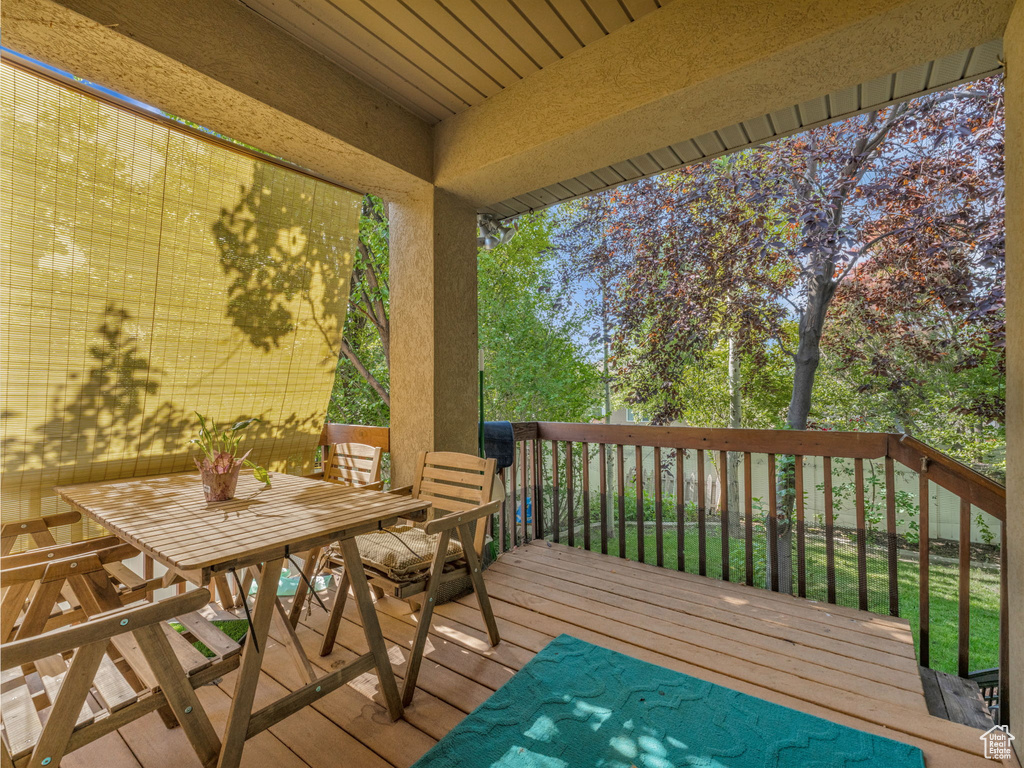 Wooden terrace with outdoor dining space