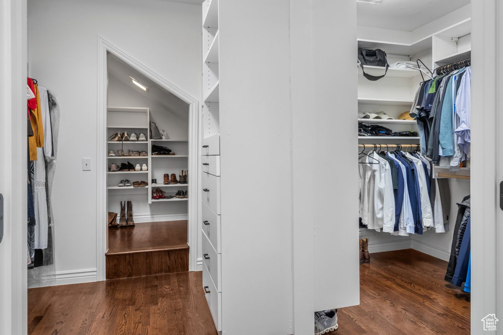 Spacious closet with wood finished floors