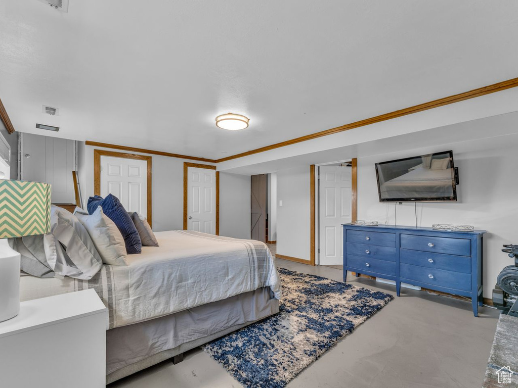 Bedroom with multiple closets