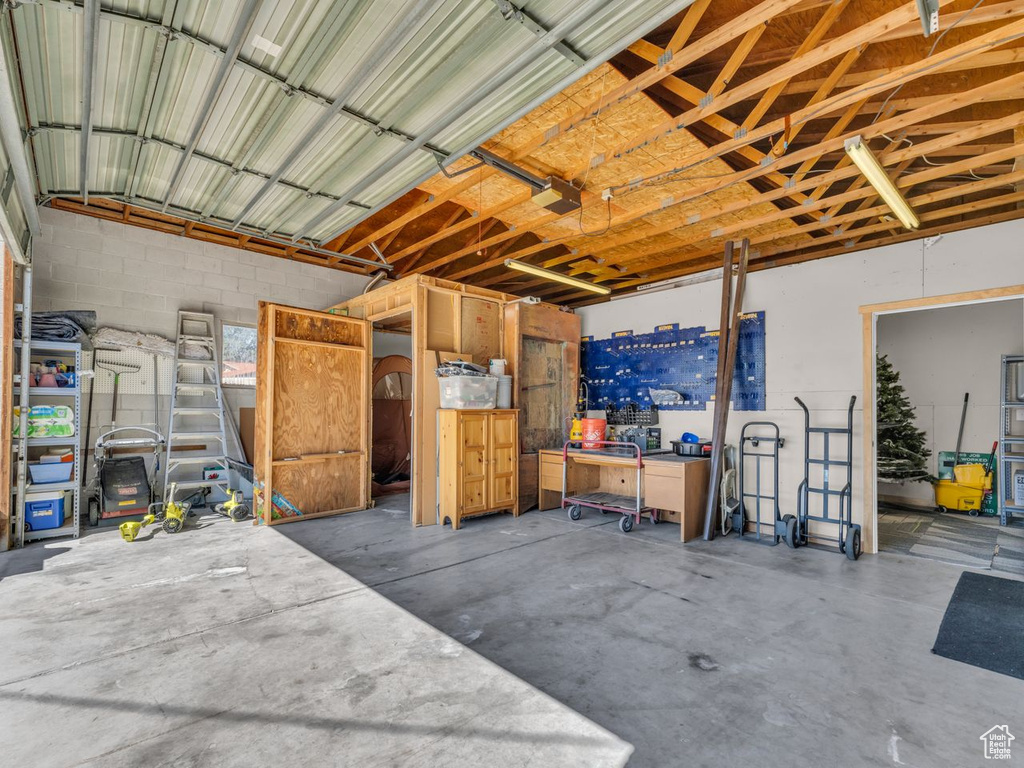 Garage featuring a garage door opener