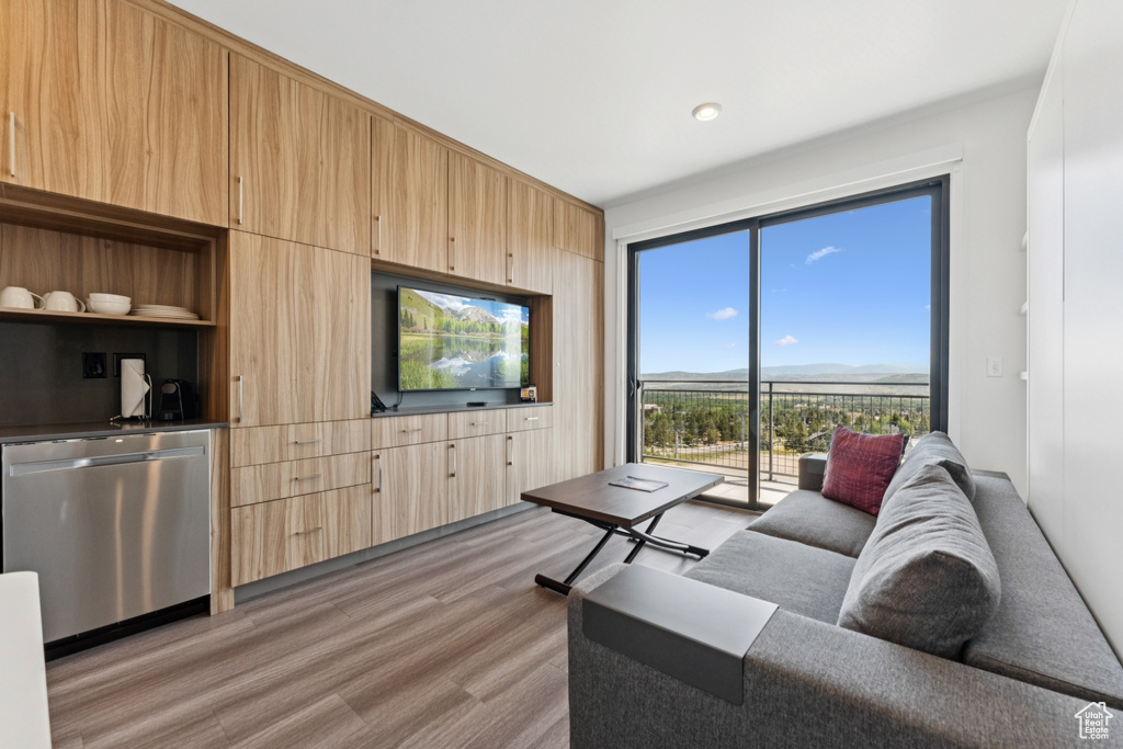 Living area featuring light wood-style flooring