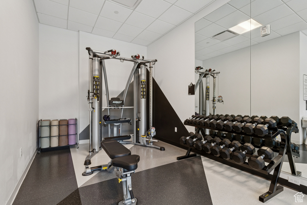 Exercise room featuring a drop ceiling
