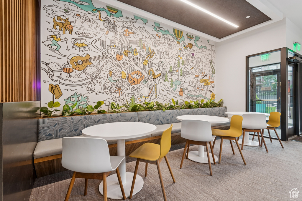 Dining area featuring ornamental molding