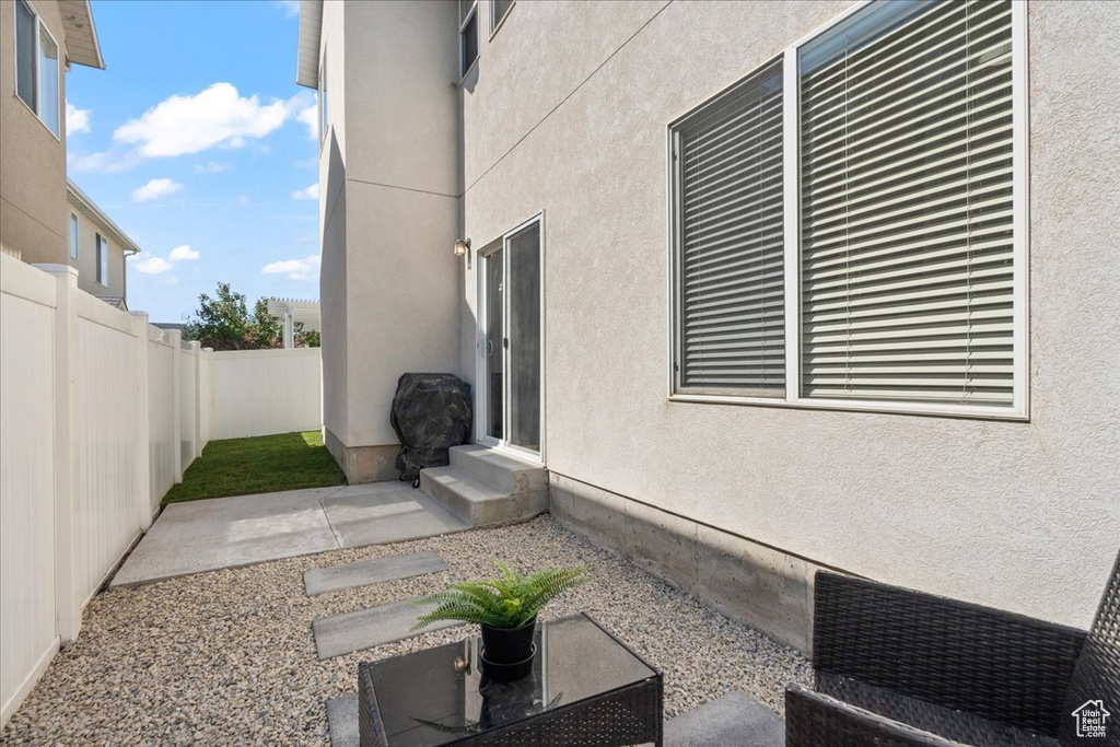 Fenced backyard featuring a patio area