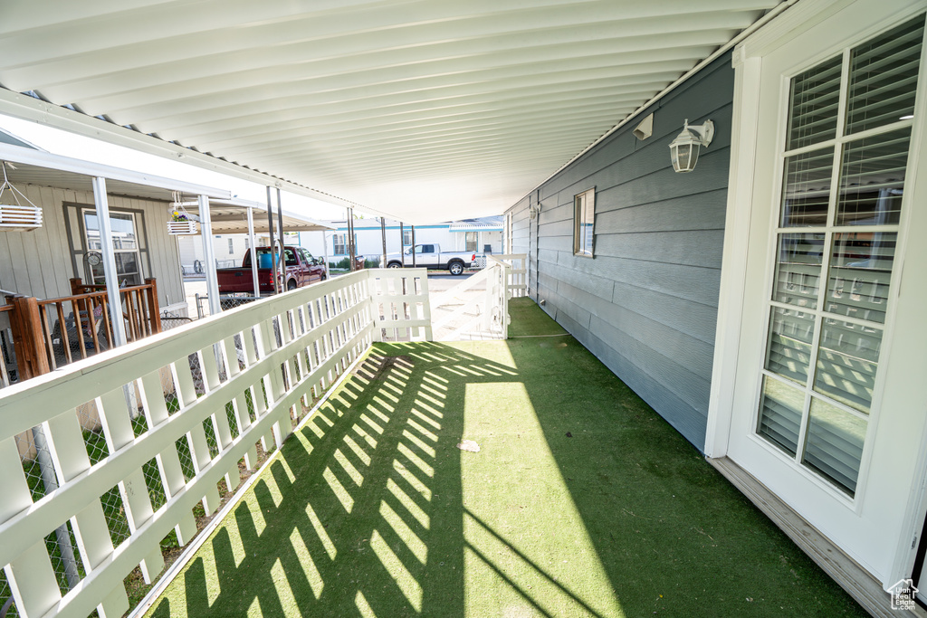 View of yard with a carport