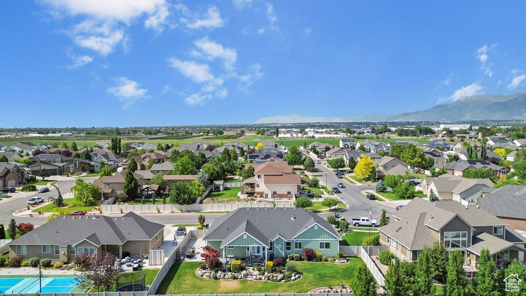 Aerial view of residential area with mountains