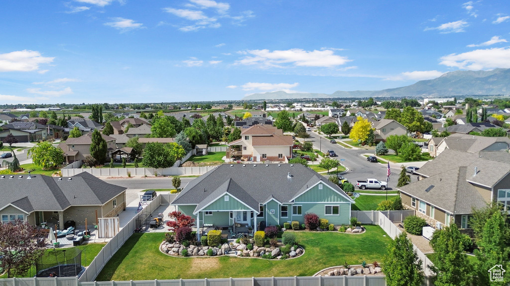 Aerial perspective of suburban area with mountains