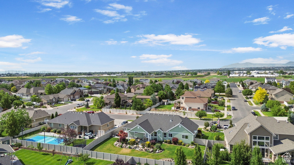 Aerial perspective of suburban area with a pool