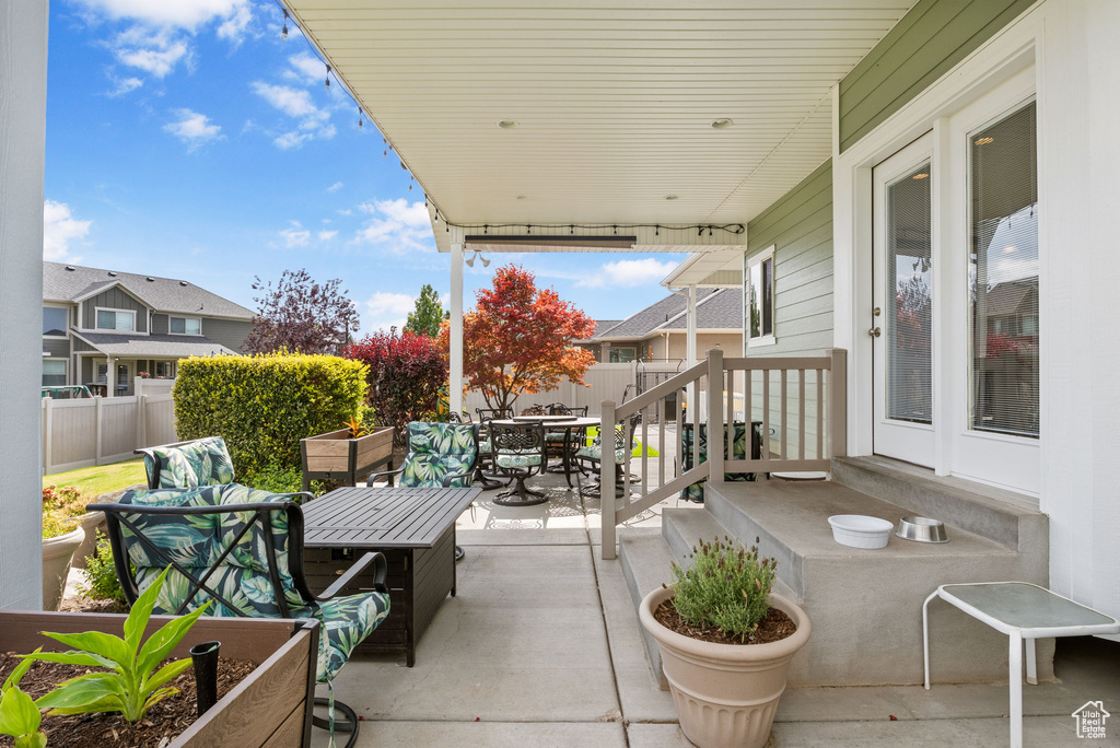 View of patio with outdoor dining area