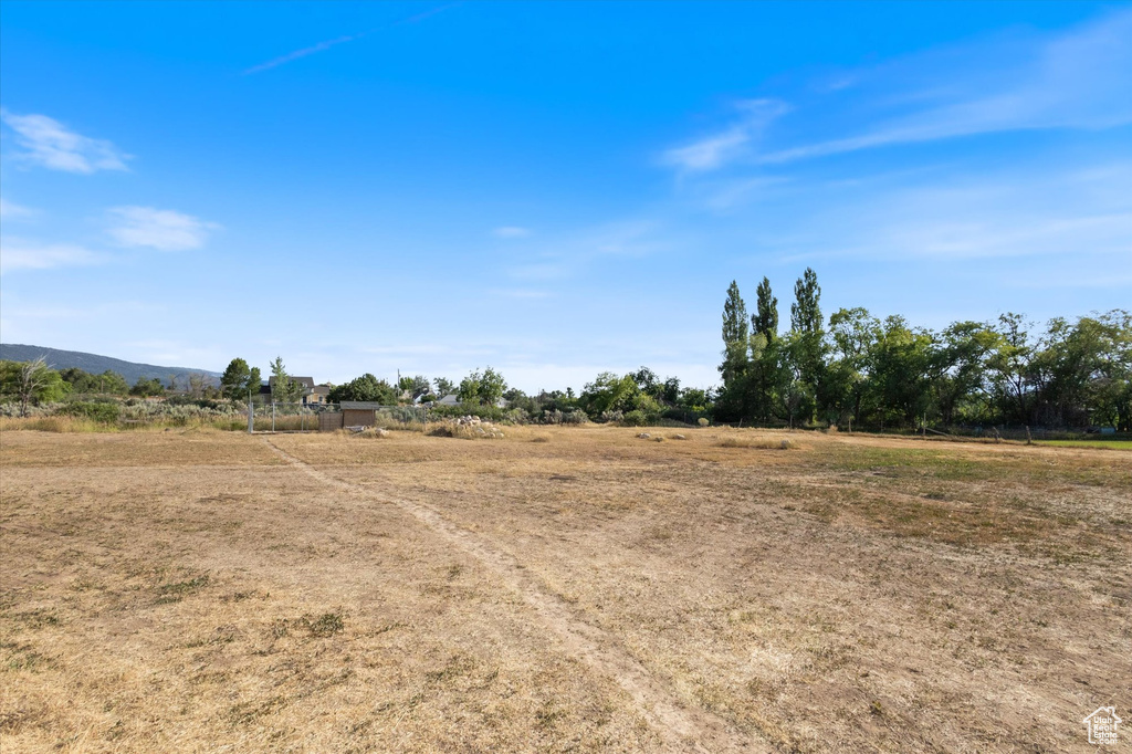 View of yard with a view of countryside