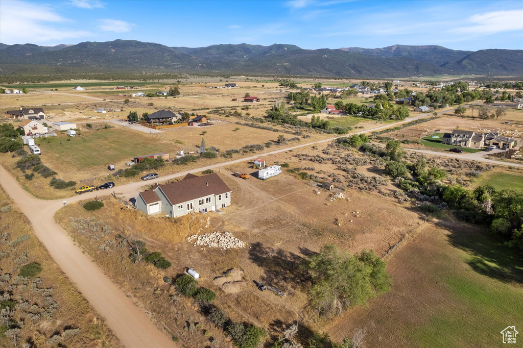 View of property location with a mountainous background and rural landscape