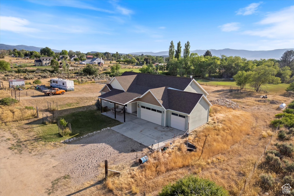 View from above of property with a mountainous background