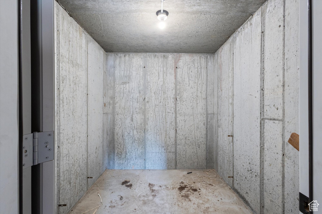 Storage room featuring elevator